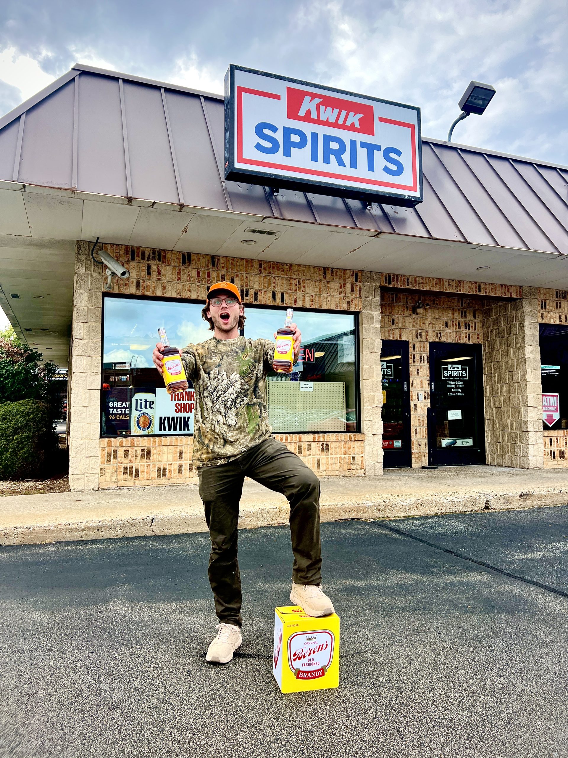 Charlie Berens at Kwik Spirits with Berens Old Fashioned Brandy.